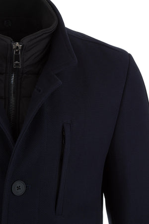 https://content.storeinfo.nl/applicatie/img/1104/20250820113829_3868197_royrobsonhybridcoatdarkeveningblue1.jpg